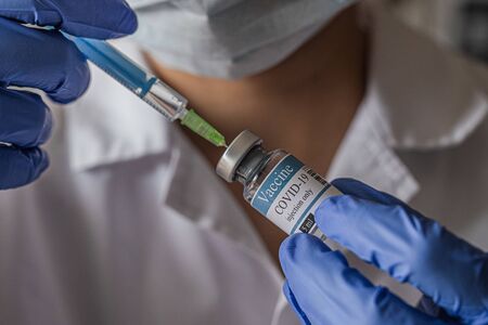 vial, covid-19, coronavirus vaccine ampoule, bottle for injection with syringeの写真素材