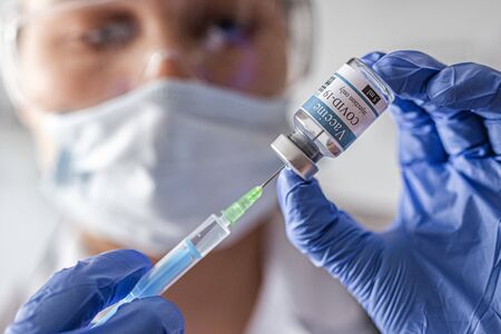 vial, covid-19, coronavirus vaccine ampoule, bottle for injectionの写真素材