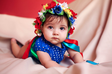 Little girl with a wreath on her headの写真素材