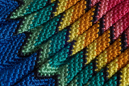 Detail of colorful knitted blankets pillows