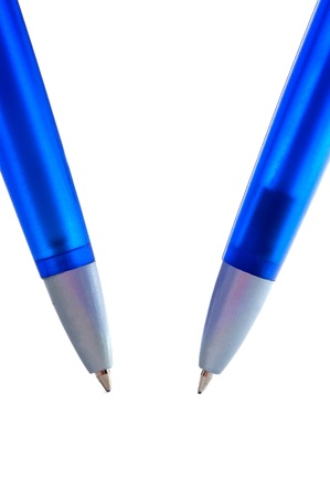 Two blue pens with white background の写真素材