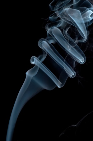 Abstract blue smoke on black backgroundの写真素材