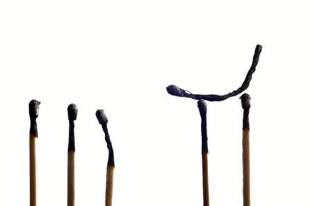 Spent matches on a white backgroundの写真素材