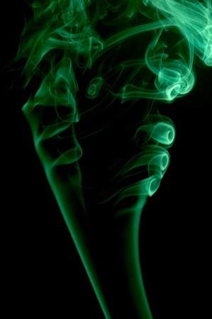 Abstract green smoke on black backgroundの写真素材