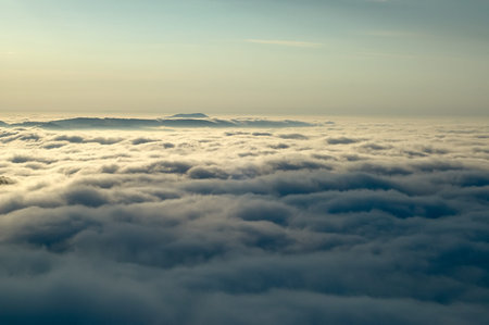 Morning inversions with wooded mountains