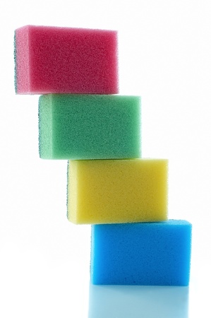 different colored sponges on white backgroundの写真素材