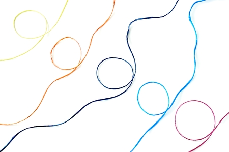 Five different colored twine on a white backgroundの写真素材