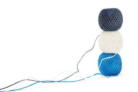 Three ball of twine on a white backgroundの写真素材