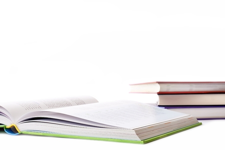 Four volumes of books on a white backgroundの写真素材