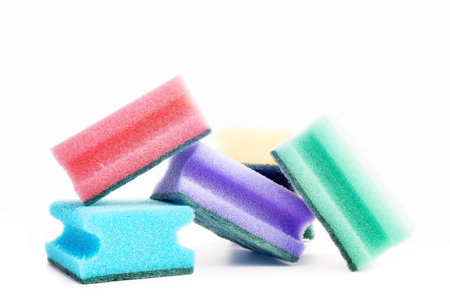 Different colored sponges on white backgroundの写真素材