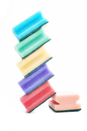 Different colored sponges on white backgroundの写真素材