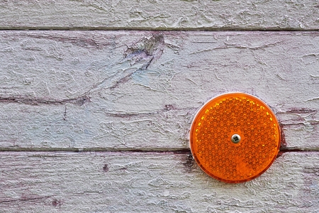 View of on the orange reflector on lumberの写真素材