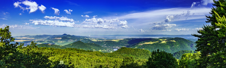 Panoramic view of the summer landscape of the Czech Middle Mountains/Czech Republic/の写真素材