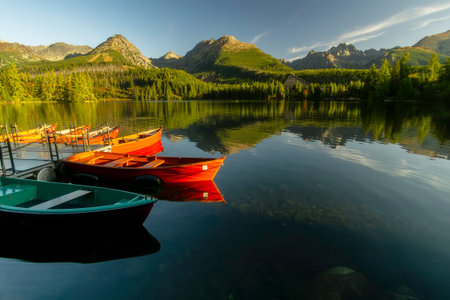 View of lake Strbske pleso with reflection of High Tatras on background from Slovakiaの写真素材