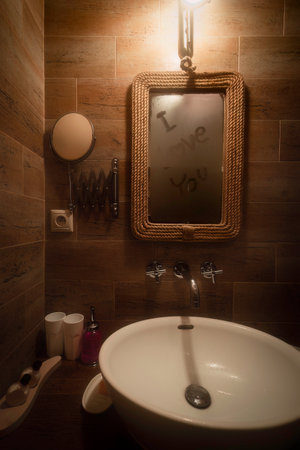 I love you written on the bathroom mirrorの写真素材