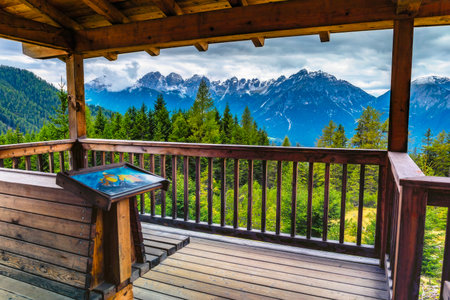 View of the Alpine Stubai mountain peaks from the wooden viewpointの写真素材