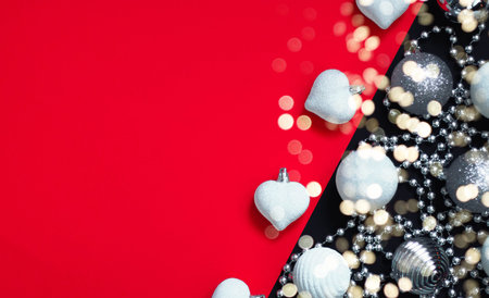 Christmas. Silver and white decorations on red and black background. Template mockup greeting card...