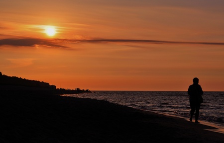 This is a view of sunset by the sea in Jastarnia, Poland.の写真素材