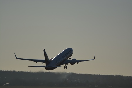 This is a view of Ryanair plane Boeing 737 8AS(WL) registered as EI-EBH over the Lublin Airport. February 17, 2015. Lublin Airport in Swidnik, Poland.のeditorial素材