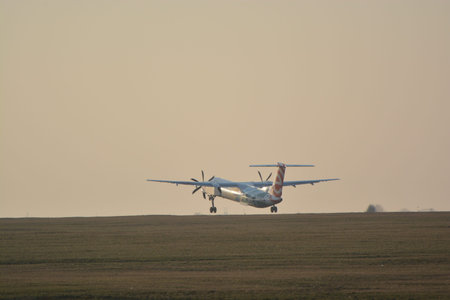 This is a view of Eurolot plane Bombardier Q400 registered as SP-EQE landing on the Lublin Airport. February 20, 2015. Lublin Airport in Swidnik, Polandのeditorial素材