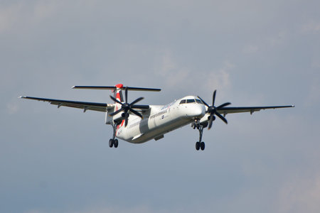 This is a view of the Eurolot plane Bombardier Dash 8 Q400 registered as SP-EQB on the Warsaw Chopin...