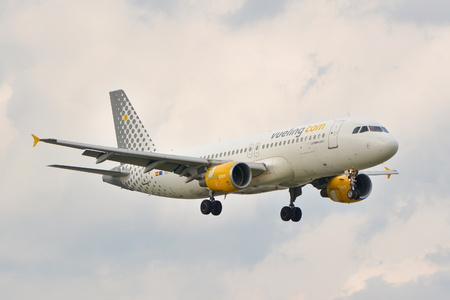 This is a view of Vueling Airbus A320 plane registered as EC-HHA on the Warsaw Chopin Airport. September 16, 2015, Warsaw, Poland.のeditorial素材