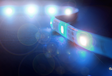 LED Stripe light close up, isolated on black background, lens flareの写真素材