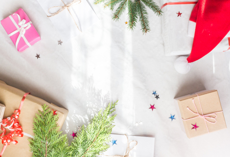 Christmas Presents gifts  flat lay with branches concept on white backgroundの写真素材