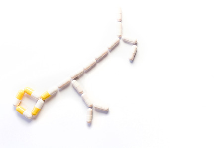 Pills concept, chemical structure form on white backgroundの写真素材