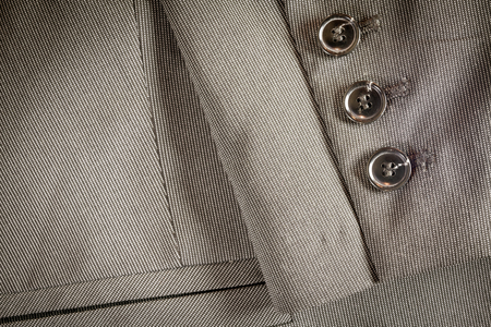 Detailed shot of Menswear Tuxedo textile and Buttonsの写真素材
