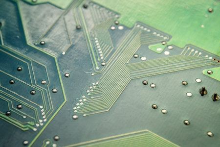 Chips, capacitors resistors on circuit board close up