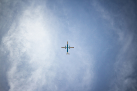 Propeller Airplane against sky, minimalist copy spaceの写真素材