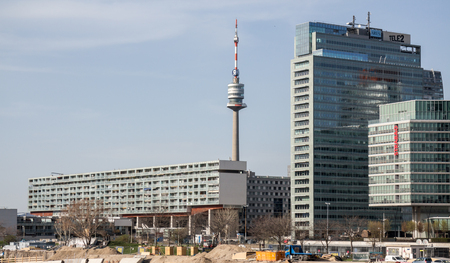 Danube tower Donauturm office right, and apartment building on the right. view from danube isle, Vienna Austria April.11,2018のeditorial素材