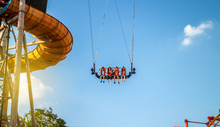 Vienna Austria May.26 2018, Kids having a ride in the swingのeditorial素材