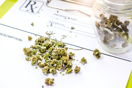 Container with medical Marihuana on Doctor prescription receiptの写真素材