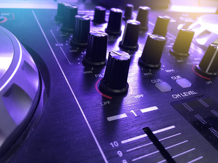 Close up of mixing turntable, DJ equipment in a club