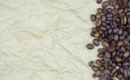 Coffee Beans On Old wrinkled Parchment Paperの写真素材