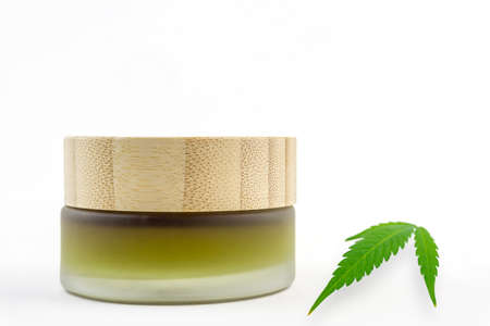 Full Spectrum CBD cannabis alternative medicine skincare cream in glass jar with copy spaceの写真素材
