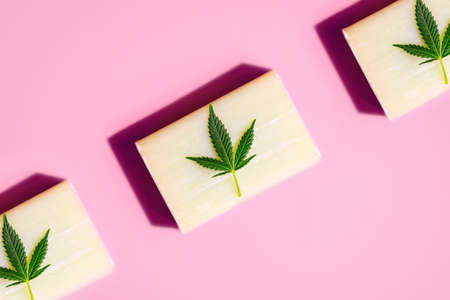 CBD Cannabidiol infused soap on pink background, concept of the use of Hemp in skin personal hygiene productsの写真素材
