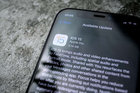 Vienna Austria September 20 2021: iPhone 12 with iOS 15 update screen close up, new operating system for iPhone devicesのeditorial素材