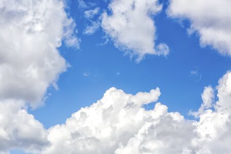 Atmosphere of clouds with blue sky. Blue sky with clouds background. Clouds floating in the sky. の写真素材