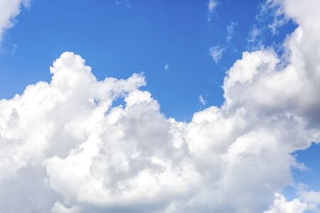 Atmosphere of clouds with blue sky. Blue sky with clouds background. Clouds floating in the sky. の写真素材