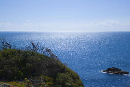 sun reflecting in the oceanの写真素材