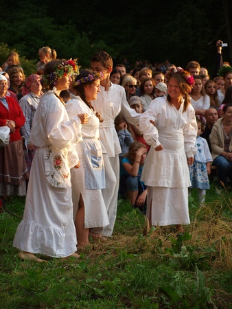 Young people singing and dancing around a bonfire as part of the rites of St. Johnのeditorial素材
