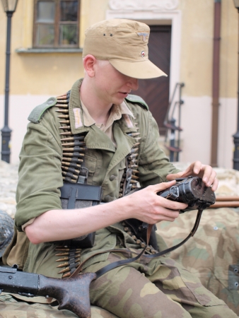 A soldier in German uniform as used during the battle of Monte Cassino in 1944.  Historical picnic Memorial of Polish II Corps, Lublin, Poland, May 12th 2013のeditorial素材