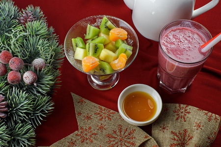 Fruit salad with berry juiceの写真素材