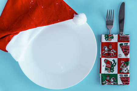 Xmas, winter, new year concept - layout white plate on which there are three Christmas trees cut...