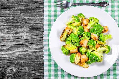 Chicken, leek and Broccoli Stir-fry on a plate, top viewの写真素材