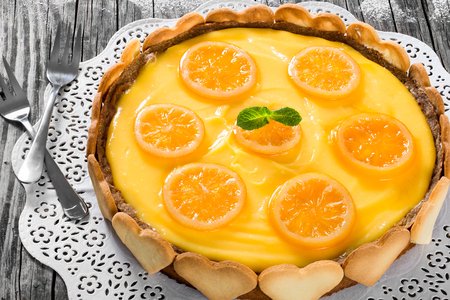 Lemon custard tart, decorated with biscuits, top view, close-upの写真素材