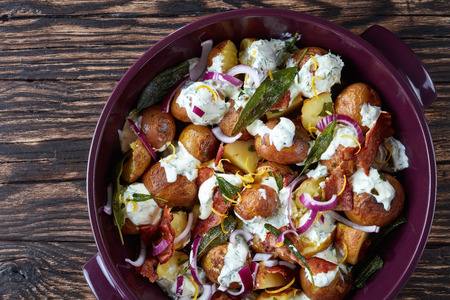 new Potato Salad with crispy bacon and sage topped with a lemon, olive oil, greek yogurt and mustard dressingの写真素材